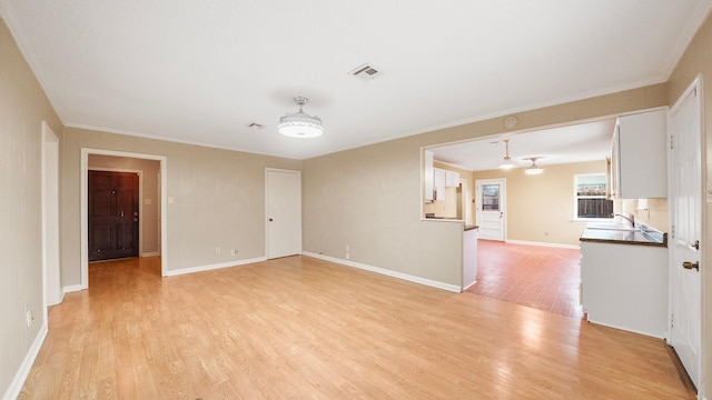 unfurnished room featuring light hardwood / wood-style floors