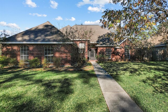 view of front of property with a front lawn