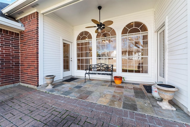 view of patio / terrace with visible vents and a ceiling fan