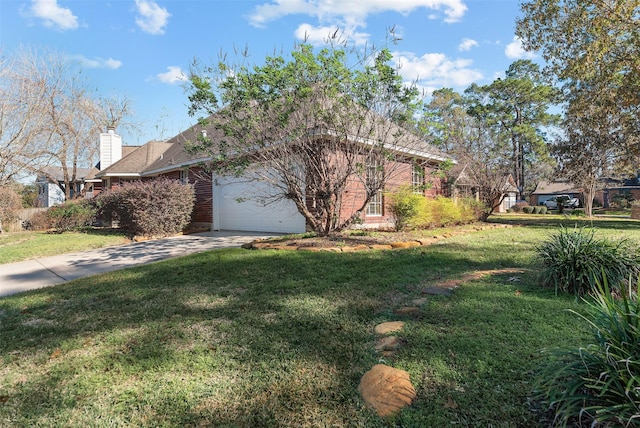 view of property exterior with an attached garage, a chimney, a lawn, and concrete driveway