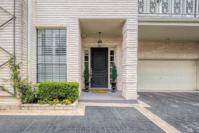 entrance to property featuring a garage