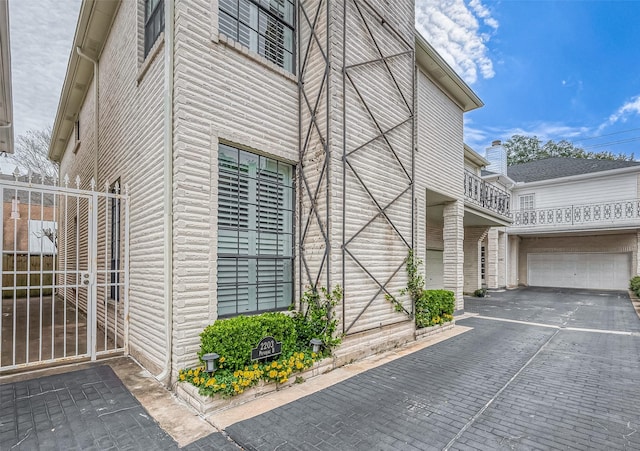 view of property exterior featuring a garage