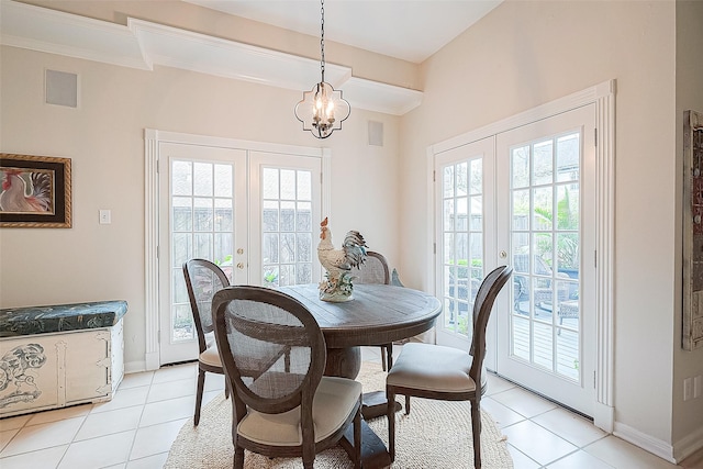 dining space featuring french doors, light tile patterned floors, and plenty of natural light