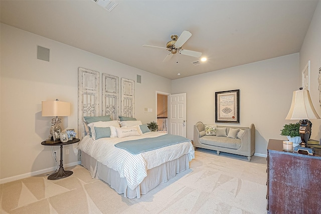 bedroom featuring ceiling fan and light carpet