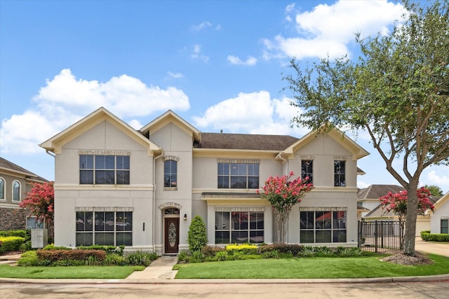 view of front of home featuring a front yard