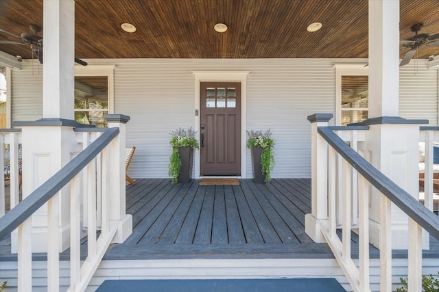 property entrance with ceiling fan and a porch