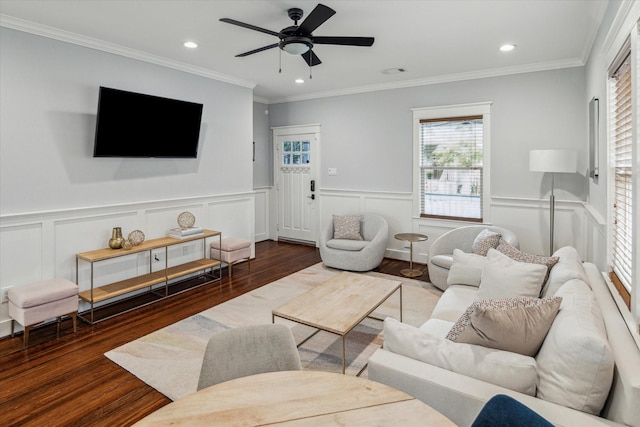 living room featuring ornamental molding, dark hardwood / wood-style flooring, and ceiling fan