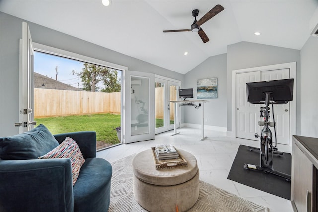 exercise area featuring ceiling fan, french doors, and lofted ceiling