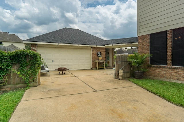 view of patio / terrace featuring a garage