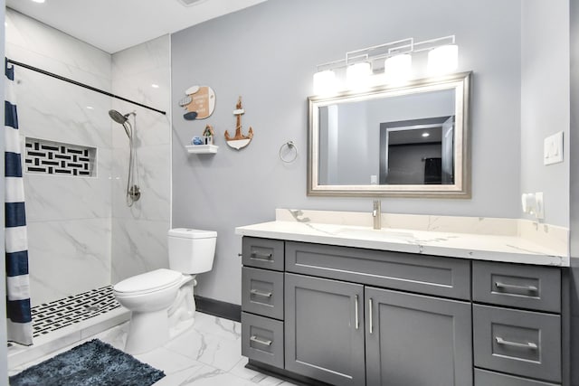 bathroom featuring a shower with shower curtain, vanity, and toilet