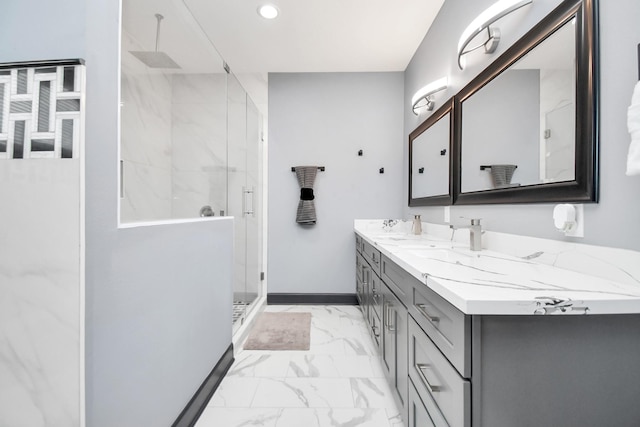 bathroom with vanity and an enclosed shower