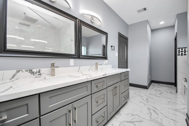 bathroom with vanity and walk in shower