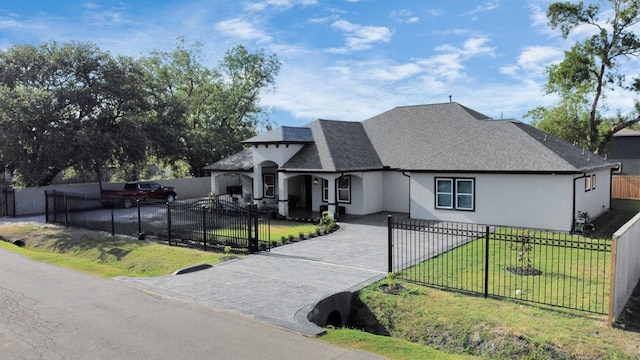 french country style house featuring a front lawn