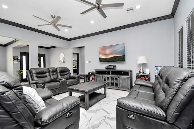 living room featuring ceiling fan and crown molding