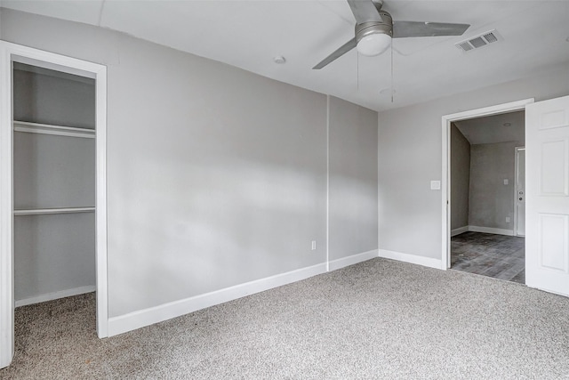 unfurnished bedroom with carpet flooring and ceiling fan