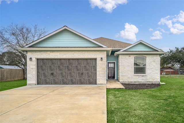 ranch-style house with a garage and a front lawn