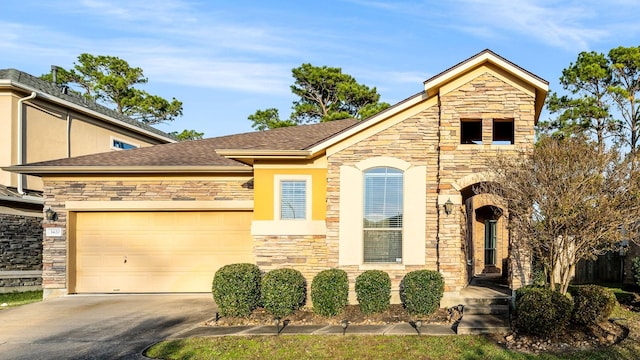 view of front of property featuring a garage