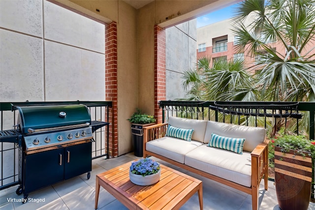 view of patio with grilling area, an outdoor living space, and a balcony