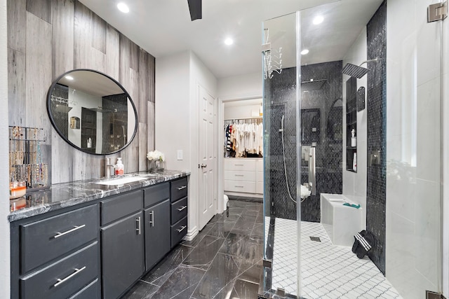 bathroom featuring vanity and walk in shower