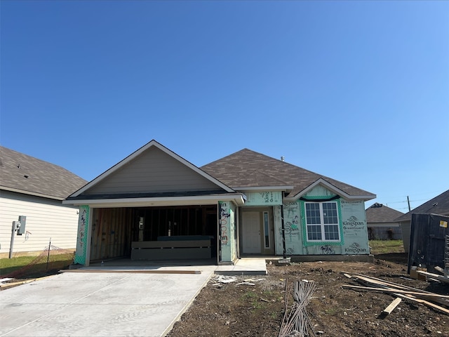 view of front of property with a garage