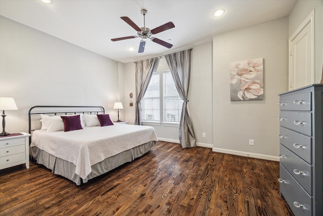 bedroom featuring ceiling fan and dark wood-type flooring