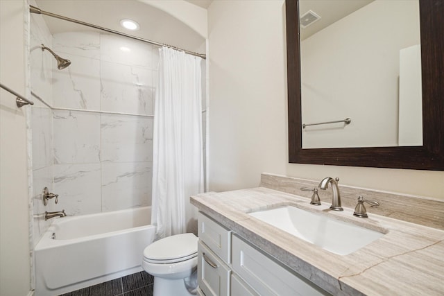 full bathroom with tile patterned floors, toilet, vanity, and shower / bathtub combination with curtain