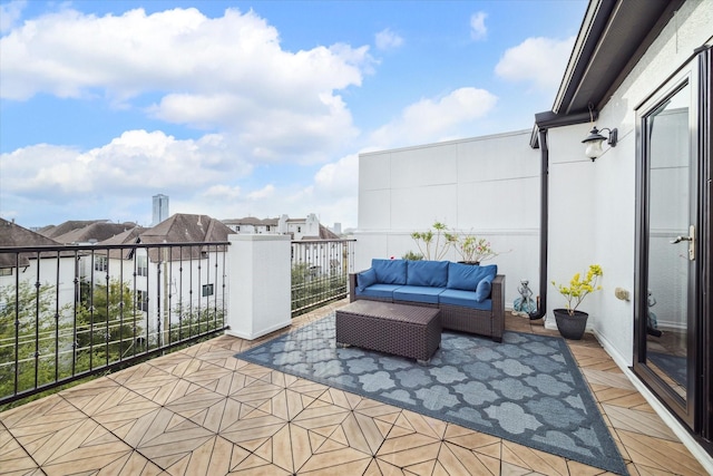 view of patio / terrace with a balcony