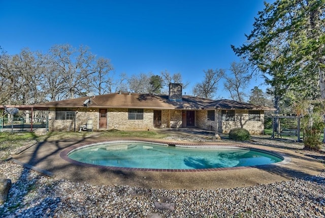 rear view of property with a patio area