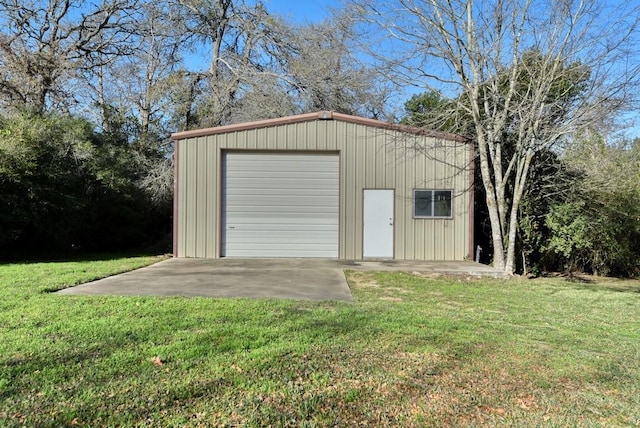 garage with a lawn