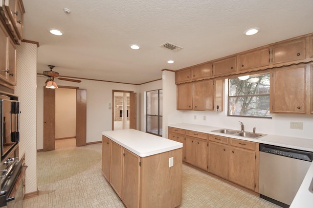 kitchen with ceiling fan, a center island, sink, stainless steel dishwasher, and ornamental molding