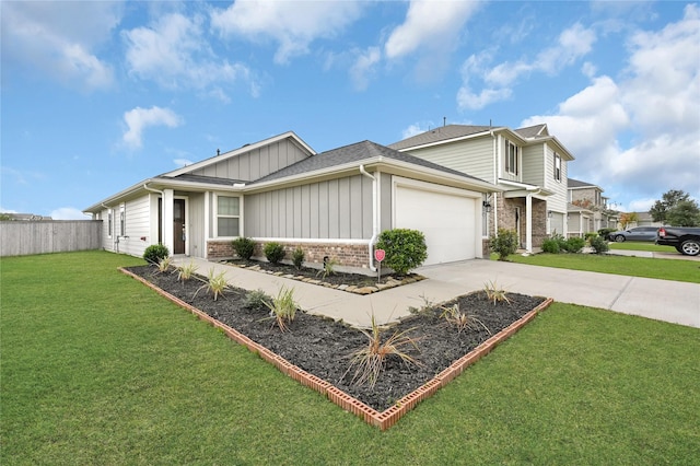 ranch-style house featuring a garage and a front yard