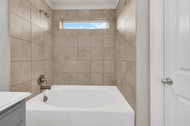 bathroom featuring bathing tub / shower combination and vanity