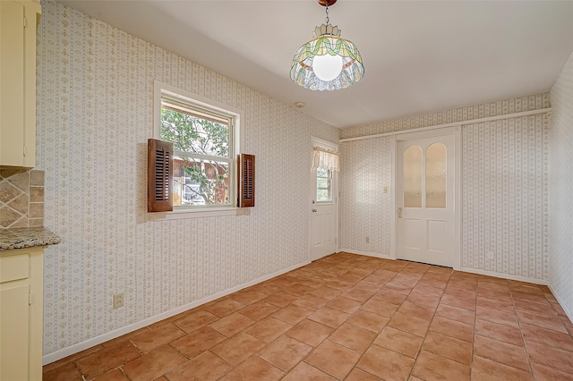 view of tiled spare room