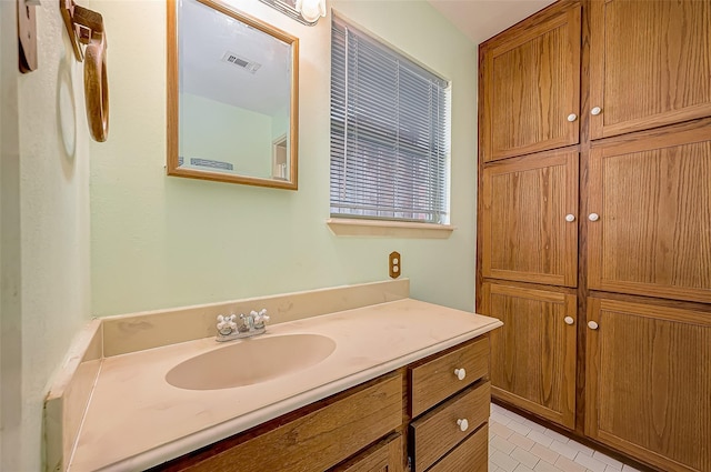 bathroom featuring vanity and tile patterned floors