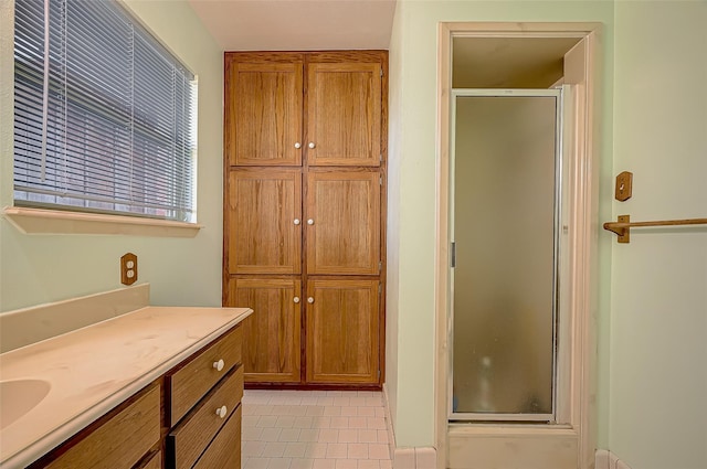 bathroom featuring vanity and walk in shower