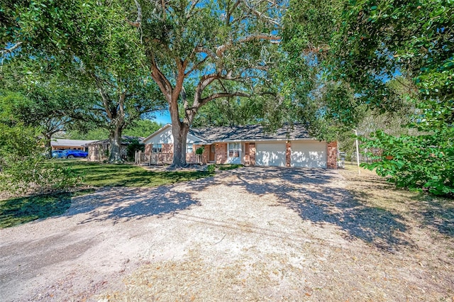 single story home featuring a garage