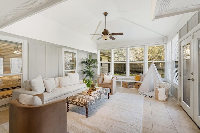 sunroom / solarium featuring vaulted ceiling and ceiling fan