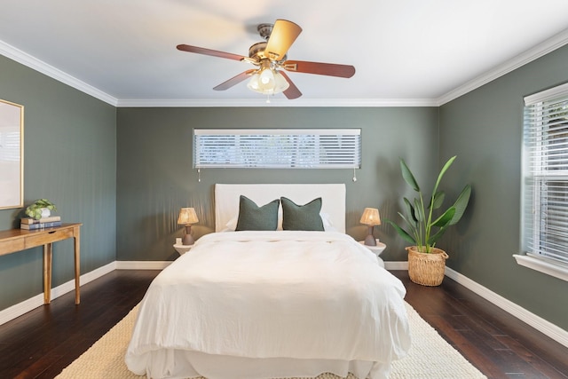 bedroom with ceiling fan, dark hardwood / wood-style flooring, and crown molding