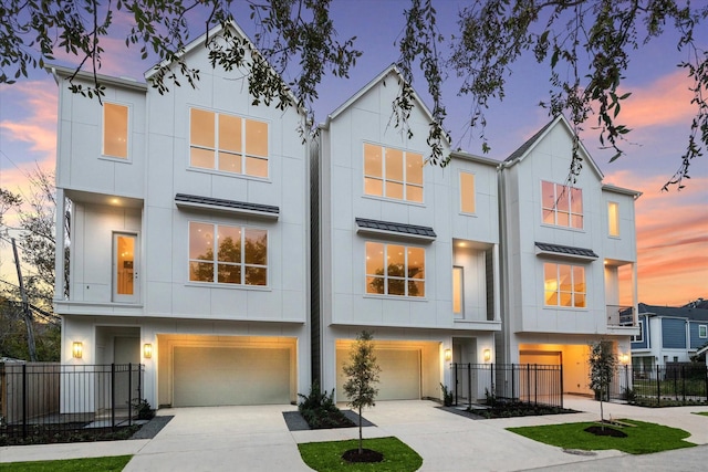 view of front of property with a garage