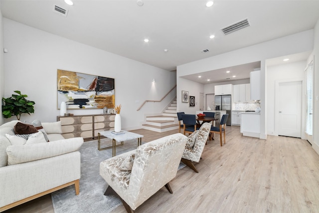 living room featuring light wood-type flooring