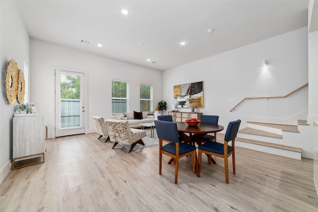 dining room with light hardwood / wood-style flooring