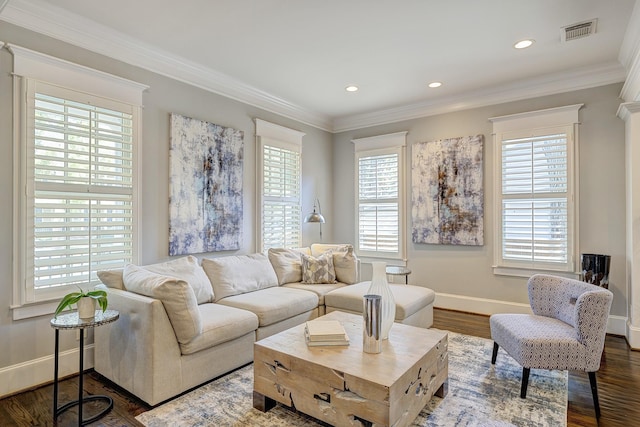 living room featuring dark wood-type flooring and ornamental molding