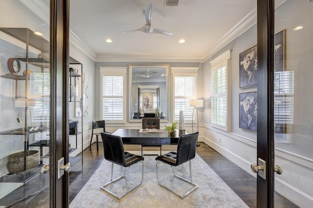 dining space with dark hardwood / wood-style flooring, crown molding, french doors, and ceiling fan