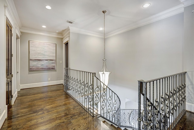 hall featuring crown molding and dark wood-type flooring