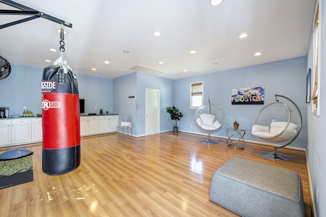 sitting room with light hardwood / wood-style flooring