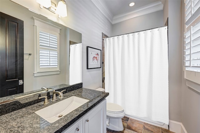 full bathroom with crown molding, plenty of natural light, toilet, and vanity