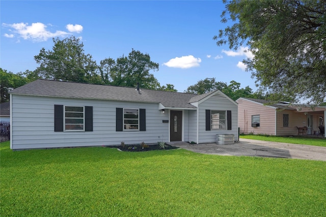 ranch-style house with a front lawn