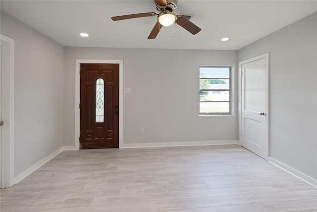 entryway featuring ceiling fan and light hardwood / wood-style flooring