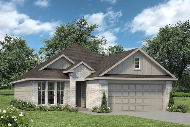 view of front of house with a garage and a front yard