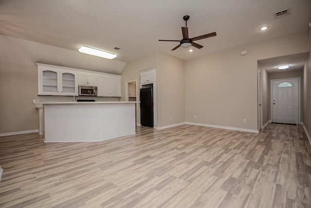 unfurnished living room with ceiling fan and light hardwood / wood-style floors